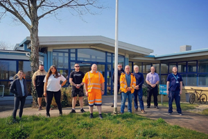 A group of people standing outside Brynsworthy Environment Centre