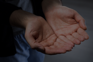 Hands begging for News.png Barnstaple action day to support #RealChangeNotSpareChange message