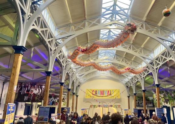 Carnival at the market with paper dragon