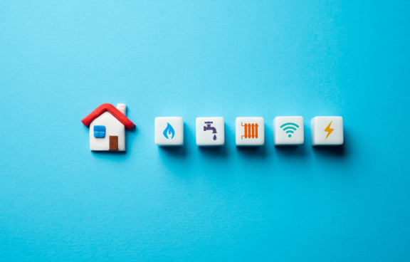 house with symbols including fire, water, gas, Wi-Fi, electric