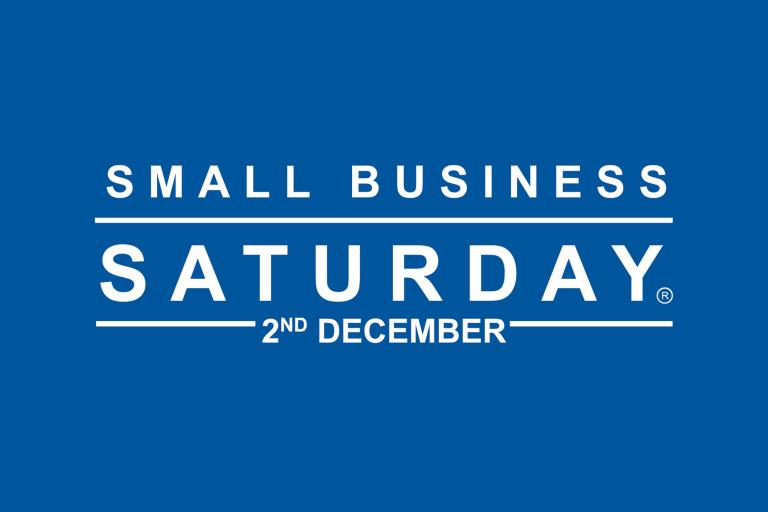Blue background with text "Small Business Saturday"