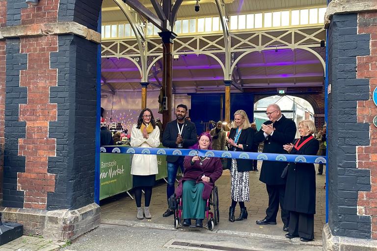 photo at the barnstaple pannier market of Cllr Helen Walker cutting the ribbon