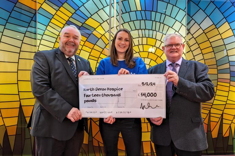Photo shows (left) North Devon Crematorium manager Mark Drummond and (right) joint committee chairman Councillor Simon Inch presenting a cheque to North Devon Hospice Business Relationship Manager, Claire Paine.