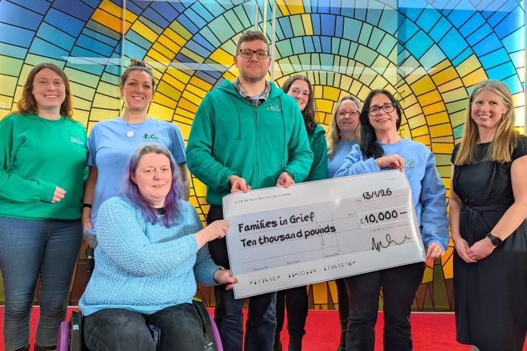 Councillor Helen Walker and North Devon Crematorium staff present a cheque to representatives from Families in Grief