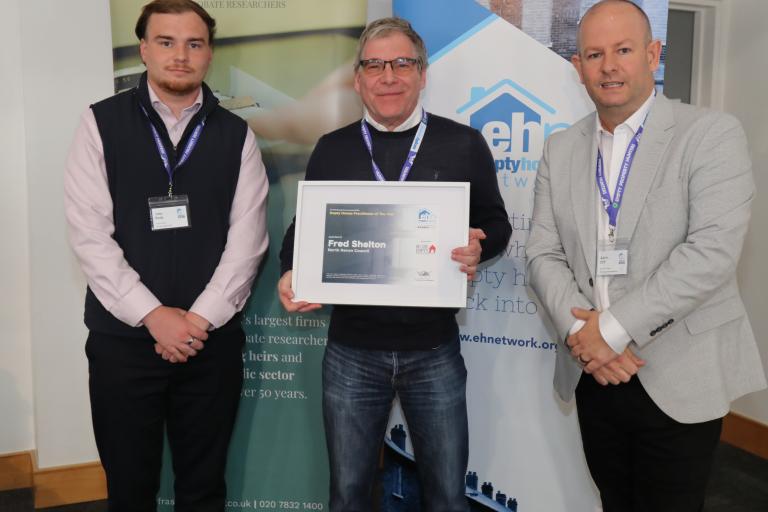 Fred being presented with his award