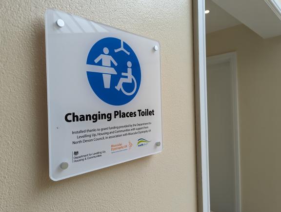 A plaque about the Changing Places toilet in Green Lanes Shopping Centre